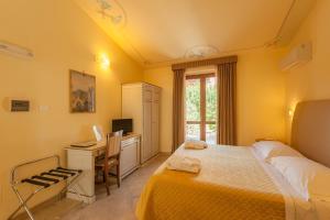 Postel nebo postele na pokoji v ubytování Hotel Saturno Fonte Pura
