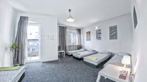 Posteľ alebo postele v izbe v ubytovaní Place4Us