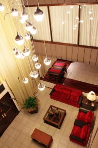 an overhead view of a room with couches and lights at Hotel Libertador in Santiago del Estero