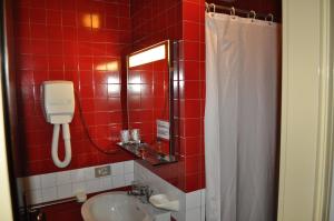Koupelna v ubytování Hotel Igea