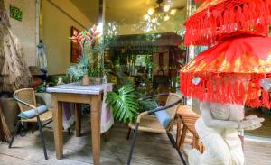 異國風情民宿（天堂·峇里） 餐廳或用餐的地方