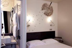Un ou plusieurs lits dans un hébergement de l'établissement Hotel Vivaldi