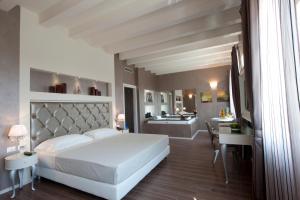 Кровать или кровати в номере Hotel Morgana