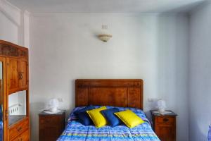 Bed and Breakfast Le Quattro Stagioni tesisinde bir odada yatak veya yataklar