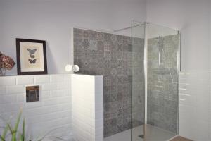 a shower with a glass door in a bathroom at Batxillerenea in Doneztebe +51 photos