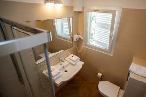 Koupelna v ubytování Hotel Cesario