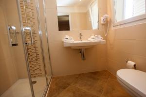 Koupelna v ubytování Hotel Cesario
