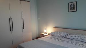 Postel nebo postele na pokoji v ubytování Apartment Marisa