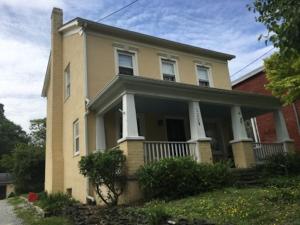 a yellow house with a red brick at Riley House in Harpers Ferry