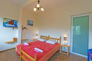 Postel nebo postele na pokoji v ubytování Yoga & Apartment Zlata Oliva