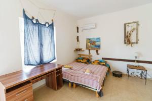 Postel nebo postele na pokoji v ubytování Yoga & Apartment Zlata Oliva