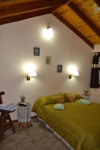 Cama ou camas em um quarto em Cabañas Bosque Del Faldeo