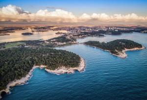 an aerial view of an island in the water at House Barbara in Banjole +16 photos