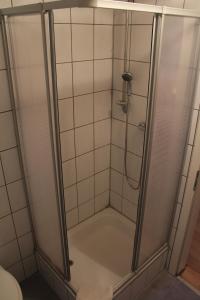 a shower with a glass door in a bathroom at Hatzenporter Paradies in Hatzenport +95 photos