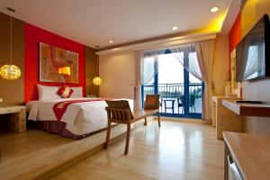 Postel nebo postele na pokoji v ubytování Golden Sea Inn