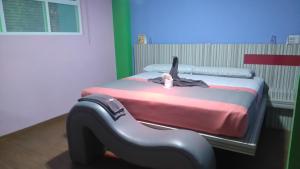 Tempat tidur dalam kamar di Hotel H - Eco Adults Only