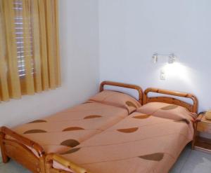 Posteľ alebo postele v izbe v ubytovaní Sylvia Studios