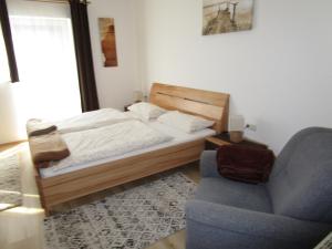 Posteľ alebo postele v izbe v ubytovaní Ferienwohnung Huber