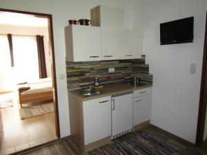 Kuchyňa alebo kuchynka v ubytovaní Ferienwohnung Huber