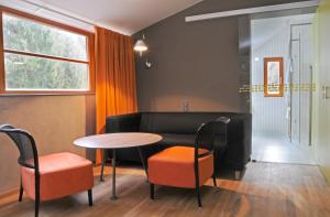 A seating area at Hotel Kokořín