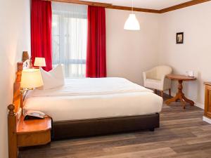 Postel nebo postele na pokoji v ubytování DORMERO Hotel Plauen + 23 fotografií