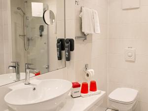 Koupelna v ubytování DORMERO Hotel Plauen