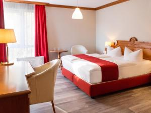 Postel nebo postele na pokoji v ubytování DORMERO Hotel Plauen