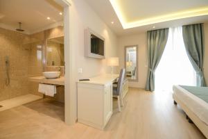 Kúpeľňa v ubytovaní Hotel Villa Garuti
