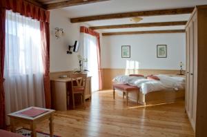Postel nebo postele na pokoji v ubytování Agritur Golden Pause