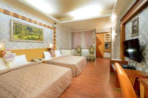 Foto de la galería de Holland Village Motel en Anping