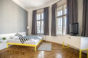 Televízia a/alebo spoločenská miestnosť v ubytovaní The Magazine Hotel