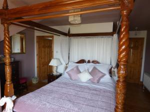 מיטה או מיטות בחדר ב-Aghadoe View Bed & Breakfast