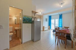 Kuchyň nebo kuchyňský kout v ubytování Yoga & Apartment Zlata Oliva