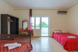 Postel nebo postele na pokoji v ubytování Yoga & Apartment Zlata Oliva