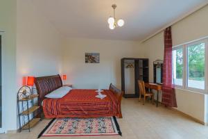 Postel nebo postele na pokoji v ubytování Yoga & Apartment Zlata Oliva