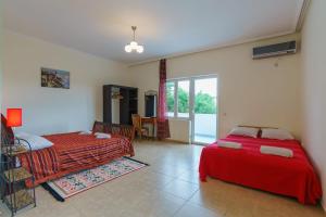 Postel nebo postele na pokoji v ubytování Yoga & Apartment Zlata Oliva