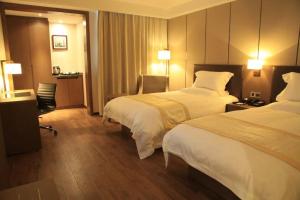 Cama o camas de una habitación en Atour X Hotel Shanghai Hongqiao Airport Konggang Road