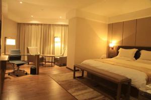 Cama o camas de una habitación en Atour X Hotel Shanghai Hongqiao Airport Konggang Road