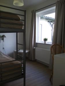 Postel nebo postele na pokoji v ubytování Hals Hotel ferielejlighed