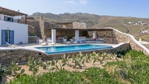Бассейн в Mykonos Panormos Villas или поблизости