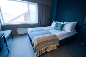 Una cama o camas en una habitación de Hotel Marena
