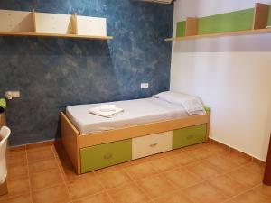 Postel nebo postele na pokoji v ubytování Finca Miralles