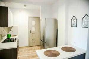 Kuchyňa alebo kuchynka v ubytovaní Apartament Centrum Harcerska