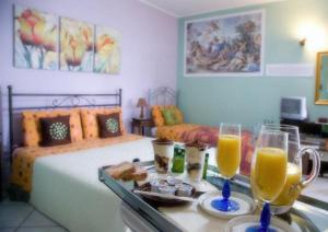 Postel nebo postele na pokoji v ubytování B&B Kore