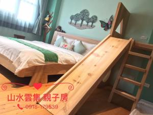 Voodi või voodid majutusasutuse Shang Shui Yun Ji B&B toas