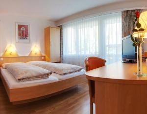 Postel nebo postele na pokoji v ubytování Hotel Eden No. 7