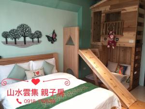 Voodi või voodid majutusasutuse Shang Shui Yun Ji B&B toas