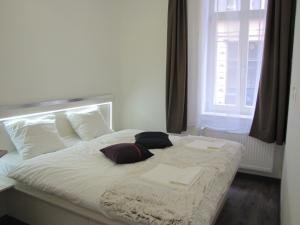 Posteľ alebo postele v izbe v ubytovaní Oasis of Downtown