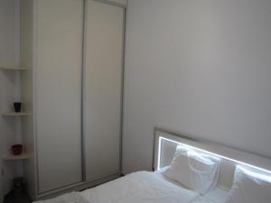 Posteľ alebo postele v izbe v ubytovaní Oasis of Downtown