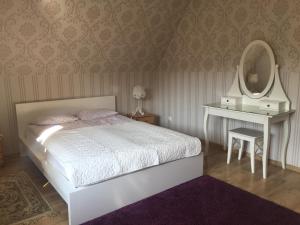 Posteľ alebo postele v izbe v ubytovaní Apartamenty Skaldowie